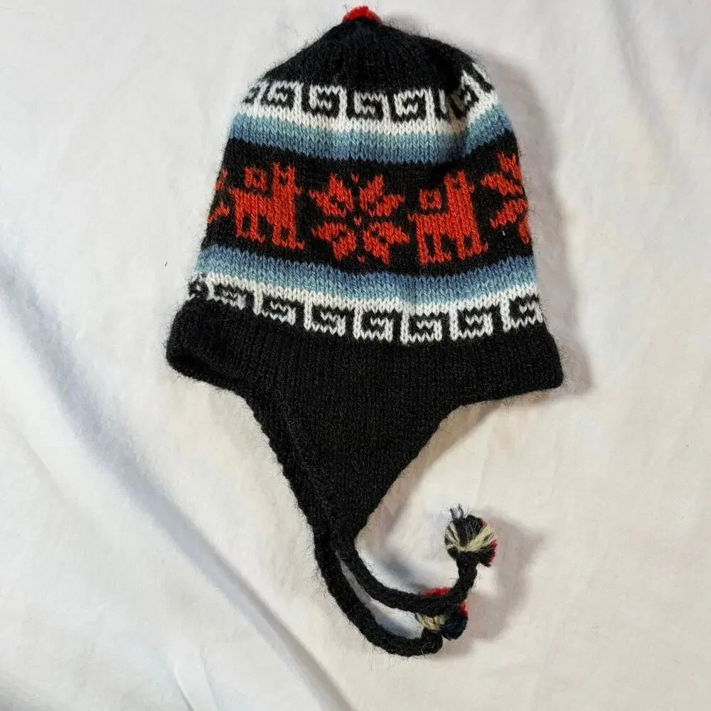 Handmade baby chullo alpaca hat from Peru. beanie, winter hat, tassels, knit cap